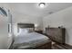 Bedroom with a wooden bedframe and chest of drawers at 913 Bending Oak Trl, Winter Garden, FL 34787