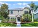 Charming two-story home with well-manicured lawn and professional landscaping at 913 Bending Oak Trl, Winter Garden, FL 34787