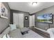 Cozy living room with a large sectional sofa and TV on the wall at 913 Bending Oak Trl, Winter Garden, FL 34787