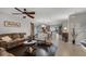 Inviting living room open to kitchen with hardwood floors and cozy decor at 913 Bending Oak Trl, Winter Garden, FL 34787