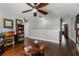 Upper level loft space with hardwood floors, books and views of the entry at 913 Bending Oak Trl, Winter Garden, FL 34787