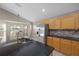 Modern kitchen with granite countertops, stainless steel appliances, and tile flooring at 9545 Southern Garden Cir, Altamonte Springs, FL 32714