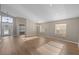 Bright open-concept living room filled with natural light, high ceilings, and beautiful floors at 9545 Southern Garden Cir, Altamonte Springs, FL 32714