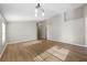 Bright living room with hardwood floors, recessed lighting, and neutral paint, offering a versatile living space at 9545 Southern Garden Cir, Altamonte Springs, FL 32714