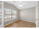 Well-lit office with hardwood floors, a large window, and stylish french doors at 9545 Southern Garden Cir, Altamonte Springs, FL 32714