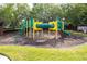 Community playground featuring climbing structures and a slide at 9545 Southern Garden Cir, Altamonte Springs, FL 32714