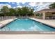 Sparkling community pool with a shaded pavilion, plenty of seating, and clear blue water at 9545 Southern Garden Cir, Altamonte Springs, FL 32714