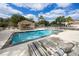 Community pool with ample seating, a shaded pavilion, and a clear blue pool perfect for relaxation at 9545 Southern Garden Cir, Altamonte Springs, FL 32714