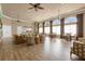Expansive community room with hardwood floors, elegant seating, and arched windows at 1031 Marcello Blvd, Kissimmee, FL 34746
