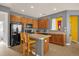 Well-equipped kitchen with modern appliances, island seating, and ample cabinet space at 1031 Marcello Blvd, Kissimmee, FL 34746
