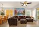 Open-concept living space with dining area and comfortable seating arrangement at 1031 Marcello Blvd, Kissimmee, FL 34746