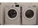 This laundry room features a new, matching LG washer and dryer set at 1089 Blue Jay Dr, Davenport, FL 33837