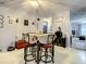 Cozy dining room with natural light, stylish table setting and charming decor creates a warm and inviting atmosphere at 1105 Tivoli Drive, Deltona, FL 32725