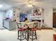 Inviting dining area with stylish furniture, open layout, and charming decor connects to other spaces in the home at 1105 Tivoli Drive, Deltona, FL 32725