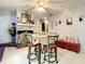 Bright dining area with cozy seating and elegant decor creating a warm and inviting space for meals and gatherings at 1105 Tivoli Drive, Deltona, FL 32725