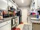 Efficient kitchen featuring appliances, ample storage, and stylish countertops for functionality and culinary creativity at 1105 Tivoli Drive, Deltona, FL 32725