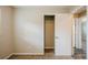 This bedroom features neutral carpet and paint, with a closet for ample storage at 1108 Jordan Ave, Orlando, FL 32809