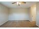 Spacious bedroom with plush carpeting and ample natural light at 1108 Jordan Ave, Orlando, FL 32809