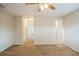 Cozy bedroom with neutral carpet and ceiling fan at 1108 Jordan Ave, Orlando, FL 32809