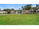 Charming single-story home featuring a well-maintained lawn and stone accents at 1108 Jordan Ave, Orlando, FL 32809