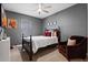 Bedroom featuring modern furniture, carpet, and a ceiling fan at 11927 Charades St, Orlando, FL 32832