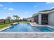 Beautiful backyard oasis featuring a large swimming pool, relaxing spa, and a screened lanai for ultimate relaxation at 11927 Charades St, Orlando, FL 32832