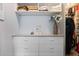 Bright walk-in closet featuring modern drawers, shelving, and decor at 11927 Charades St, Orlando, FL 32832