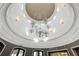 Magnificent ceiling with chandelier and architectural details at 125 Silver Maple Rd, Groveland, FL 34736