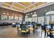 Inviting resident lounge featuring a brick accent wall and comfortable seating areas at 125 Silver Maple Rd, Groveland, FL 34736