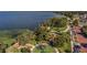 Beautiful aerial view of waterfront park featuring lake views and playground at 1251 Blue Daze Ln, Eustis, FL 32726