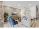 Comfortable living room with modern decor, shiplap wall, and ample seating at 1251 Blue Daze Ln, Eustis, FL 32726
