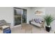 Relaxing covered patio with comfortable seating, stylish decor, and a serene ambiance at 1251 Blue Daze Ln, Eustis, FL 32726