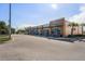 Shopping center with well-maintained storefronts and ample parking at 1251 Blue Daze Ln, Eustis, FL 32726