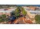 Charming street view featuring brick-paved roads, lush trees, and historic buildings, offering a vibrant and walkable community atmosphere at 1251 Blue Daze Ln, Eustis, FL 32726