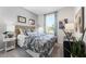 Cozy bedroom with natural light, decorative accents, and stylish furnishings at 1252 Blue Daze Ln, Eustis, FL 32726