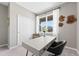 Bright office with large window, modern desk, and closet space at 1252 Blue Daze Ln, Eustis, FL 32726