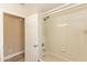 Bright bathroom features a shower-over-tub with tiled walls and a shower caddy for storage at 128 Brushcreek Dr, Sanford, FL 32771