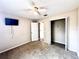 Bedroom with ceiling fan, closet and neutral walls at 128 Brushcreek Dr, Sanford, FL 32771