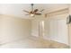 Spacious bedroom featuring neutral walls, carpet flooring, ceiling fan, and a closet, creating a serene retreat at 128 Brushcreek Dr, Sanford, FL 32771