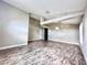 Spacious living room featuring high ceilings, ceiling beams, tile floors, and neutral paint at 128 Brushcreek Dr, Sanford, FL 32771
