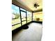 Enclosed patio space, perfect for relaxing and enjoying the outdoor view at 128 Brushcreek Dr, Sanford, FL 32771
