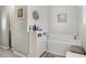 Bathroom featuring a tub with a cabinet for storage at 140 Elgin Blvd, Davenport, FL 33897