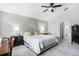 Bedroom with neutral color scheme, carpet, and lamps at 140 Elgin Blvd, Davenport, FL 33897
