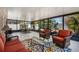 Screened in patio with seating, offering views and a relaxing outdoor space at 140 Elgin Blvd, Davenport, FL 33897