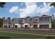 Charming row of modern townhouses with gray siding, stone accents, and attached garages at 14938 Harvest St, Orlando, FL 32824