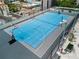 Rooftop basketball court with a blue playing surface, offering an ideal space for recreation and sports activities at 150 E Robinson St # 717, Orlando, FL 32801