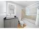 Bathroom features a modern vanity, updated lighting and a shower-tub combination at 150 E Robinson St # 717, Orlando, FL 32801