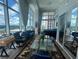 A spacious living room with floor to ceiling windows offering an abundance of natural light at 150 E Robinson St # 717, Orlando, FL 32801