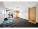 Bright health and wellness center featuring a lounge area with a comfortable sofa and a view of the fitness equipment at 150 E Robinson St # 717, Orlando, FL 32801