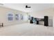 Spacious room with neutral carpet, windows, and ample space for furniture and decor at 15485 Sandfield Loop, Winter Garden, FL 34787